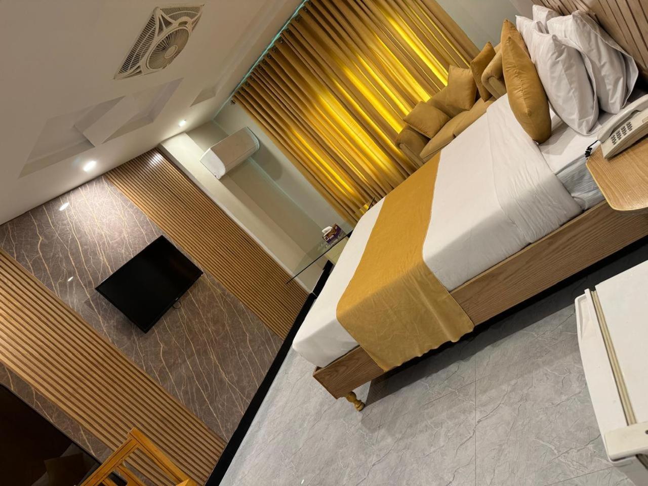 Atlas Hotel Исламабад Экстерьер фото
