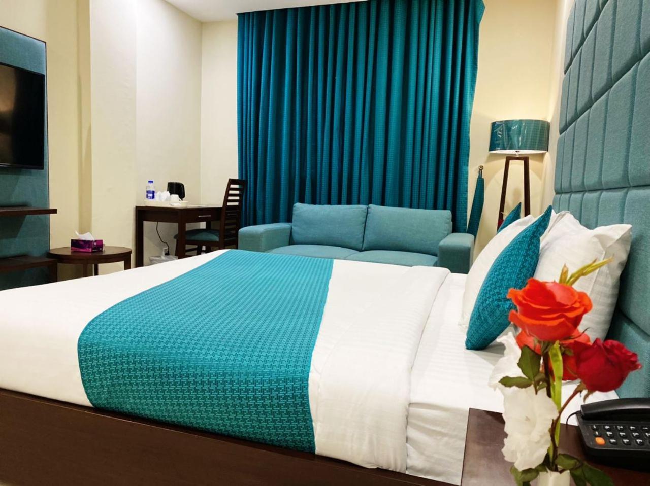 Atlas Hotel Исламабад Экстерьер фото