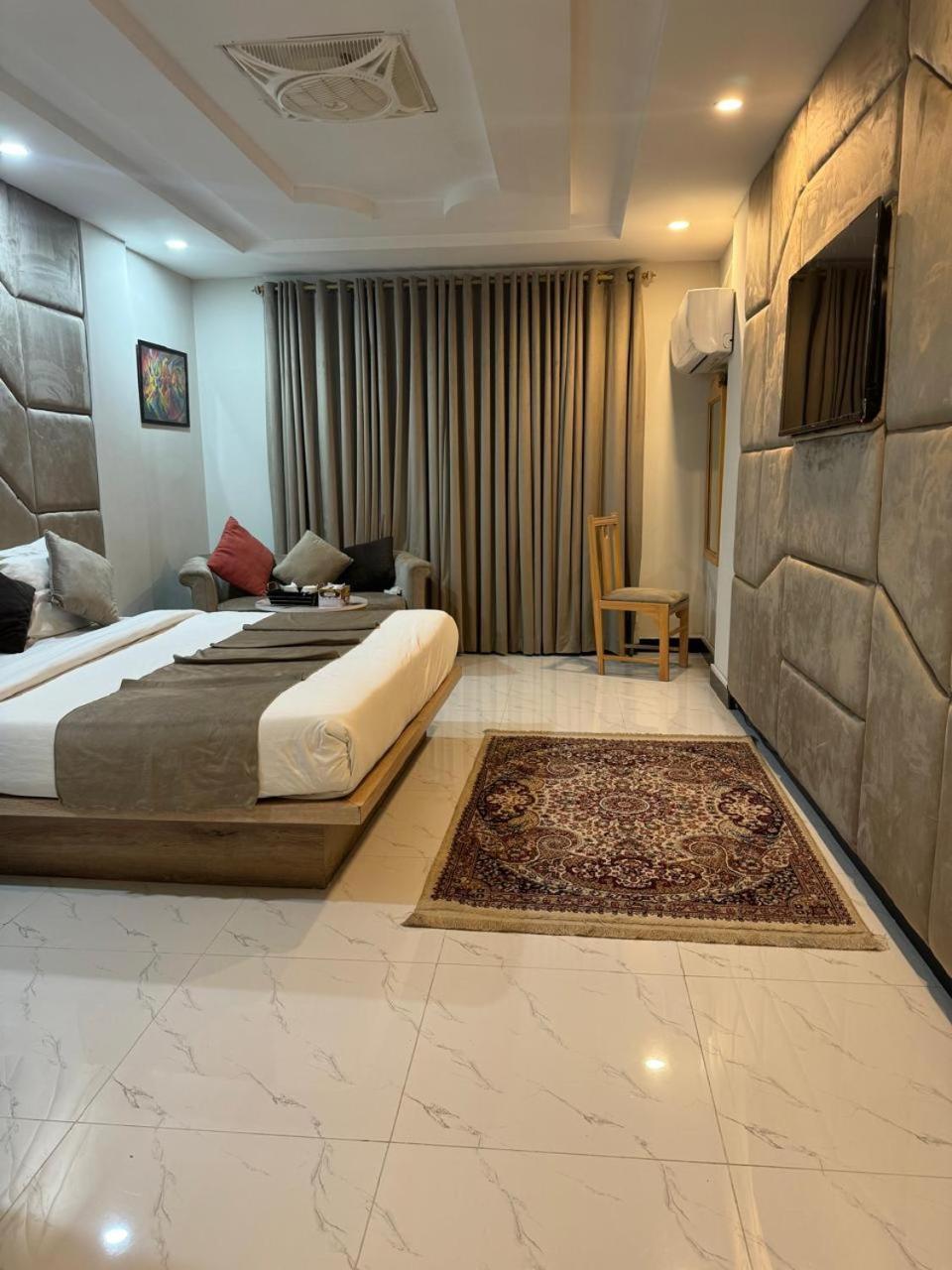 Atlas Hotel Исламабад Экстерьер фото