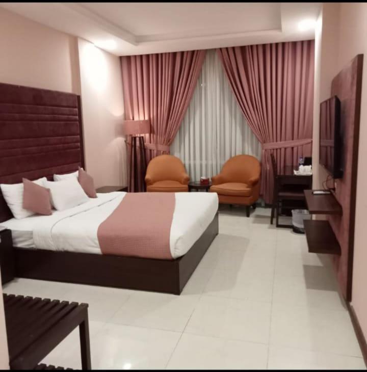 Atlas Hotel Исламабад Экстерьер фото