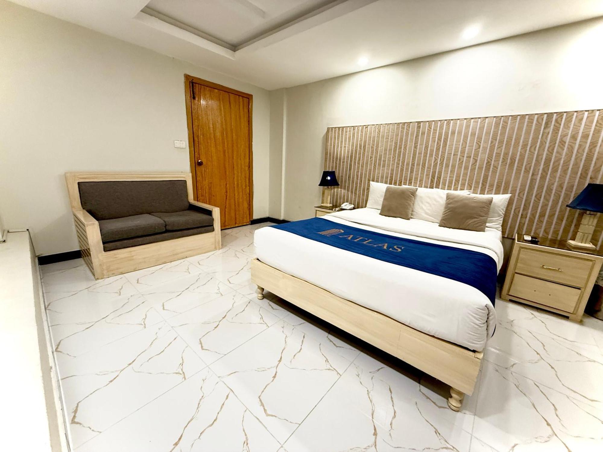 Atlas Hotel Исламабад Экстерьер фото